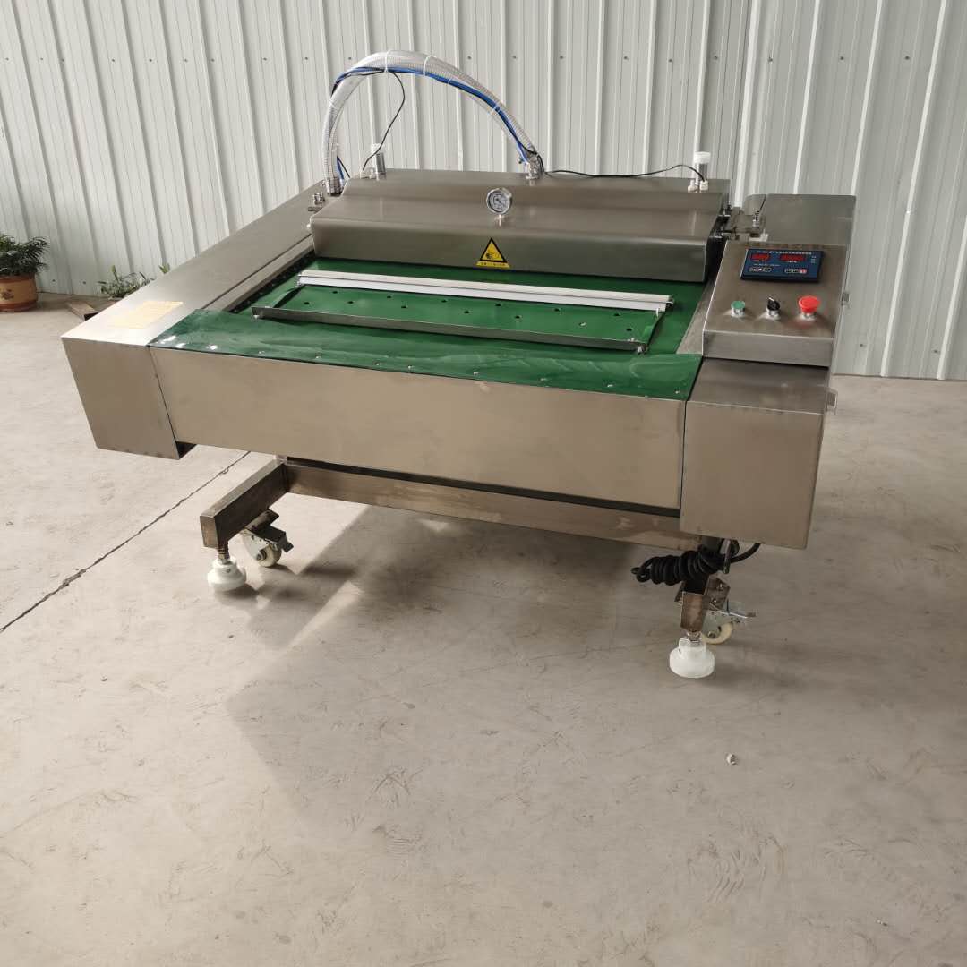 Роликовая вакуумная упаковочная машина